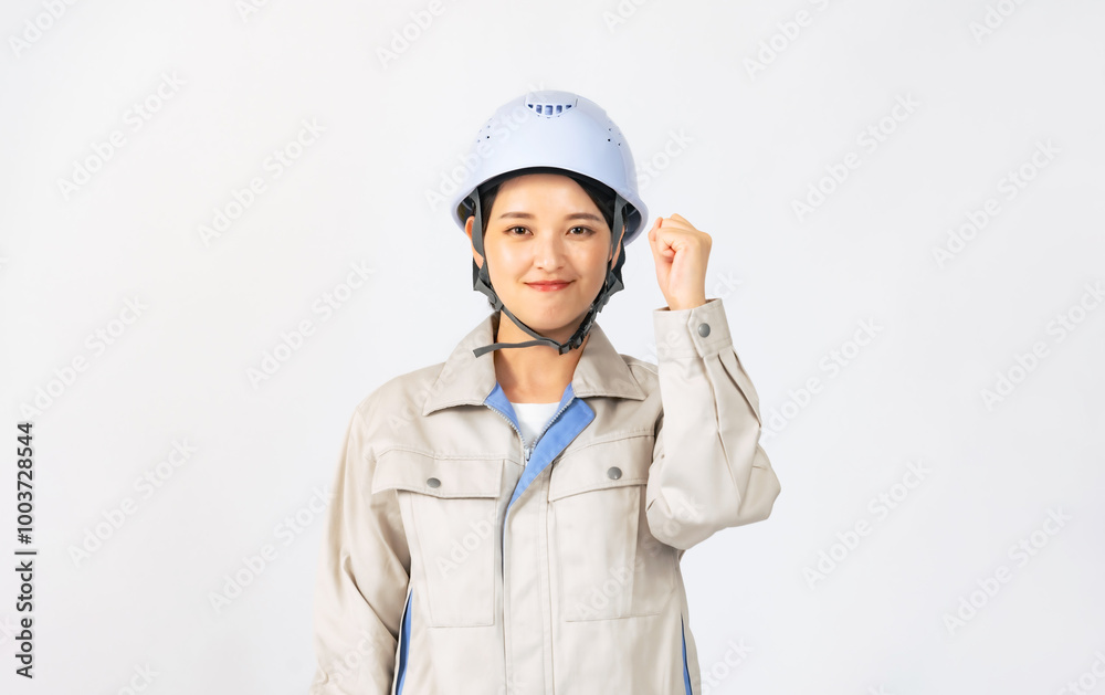 Aufkleber ガッツポーズするヘルメットと作業服を着た女性　作業員　エンジニア