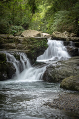 River goes like stair from the beautiful shape rocks, hidden in the forest, in Manyueyuan Forest Recreation Area, New Taipei City, Taiwan.
