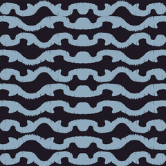 Motif ethnic ikat pattern seamless textile. Antique pattern, white flowers, navy blue background.	