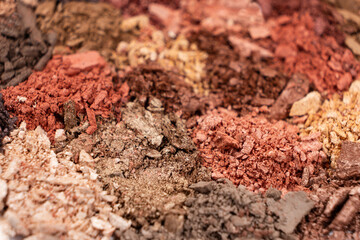 Macro texture of different shades of eyeshadow