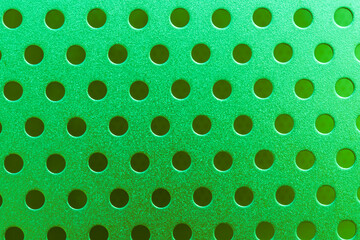green polka dots on a fabric © Евгения Смульская