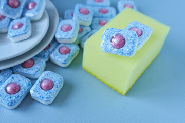 Dishwasher tablets and dishwasher sponge.