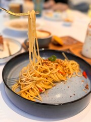 spicy pasta in ceramic plate