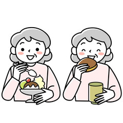 笑顔で間食をするシニア女性