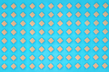 Fototapeta premium ダイヤの形をしたブロックを等間隔に並べた深い青色のテクスチャー