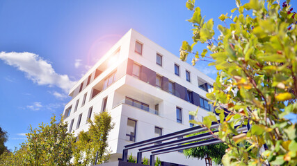 Eco apartment building saving energy and fresh air concept. European residential architecture...