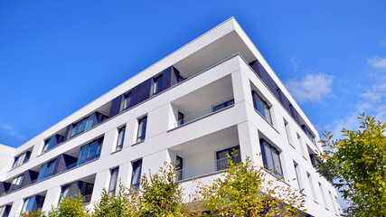 Eco apartment building saving energy and fresh air concept. European residential architecture...