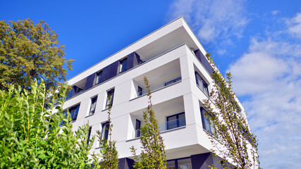 Eco apartment building saving energy and fresh air concept. European residential architecture...
