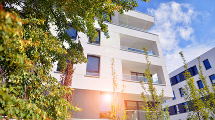Eco apartment building saving energy and fresh air concept. European residential architecture...