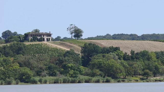 House on Hill Overlooking River