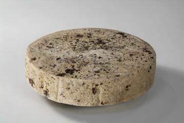 Cheese wheel on white background