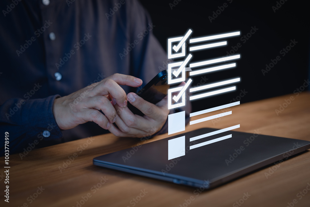 Aufkleber Person using a smartphone to check items off a digital checklist, productivity, and organization. Concept emphasizes the use of technology for staying organized and completing tasks efficiently.