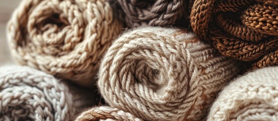 Brown and light brown knitting pattern rolls with a copy space image