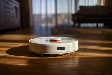 Picture of robot vacuum cleaner dusting floor in house.