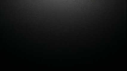 Solid black background texture for versatile design applications and creative projects