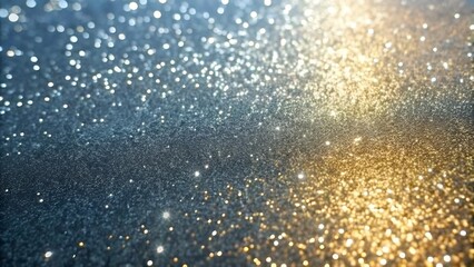 Obraz premium Shimmering glitter background with golden and silver sparkles for festive and artistic designs