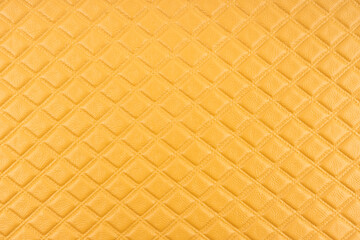 Yellow color leather texture, background.
