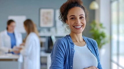 Pregnant woman receiving prenatal care in a maternity clinic with support from medical staff highlighting maternal healthcare Large space for text in center Stock Photo with copy space