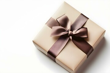 Obraz premium Gift box wrapped with a ribbon set against a white background. Copy space image. Place for adding text and design
