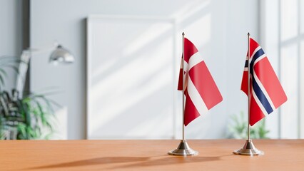 FLAGS OF DENMARK AND NORWAY ON TABLE