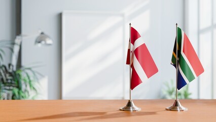 FLAGS OF DENMARK AND SOUTH AFRICA ON TABLE