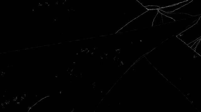 Broken cracks glass fracture effect on black background