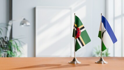 FLAGS OF DOMINICA AND LESOTHO ON TABLE