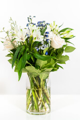 Elegant White Rose Bouquet Adorns a Beautiful Vase