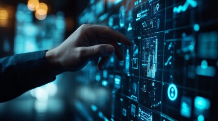 A hand is touching a computer screen with a blue background