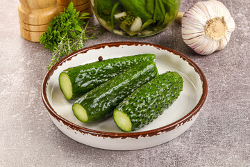 Homemade lighty salted cucumbers with herbs