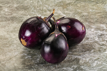 Raw violet and black eggplant