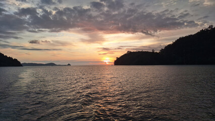 Beautiful twilight, Sunset on sea between the Islands. Mandeh, West Sumatra, Indonesia