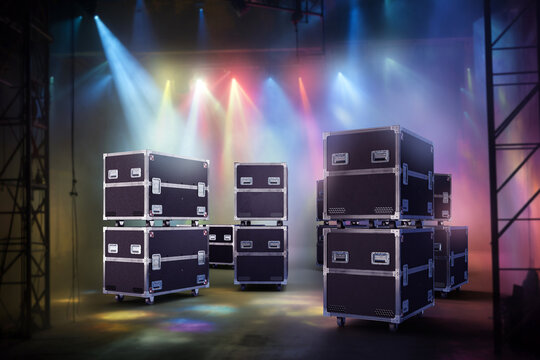 Containers on wheels at concert venue. ATA flightcase on nightclub stage. Black containers with lighting equipment. PLY flightcase for safe transportation of concert equipment. 3d image