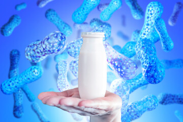 Probiotics for stomach. Jar of yogurt in hand of nutritionist. Probiotic cells on blue. Dietary...