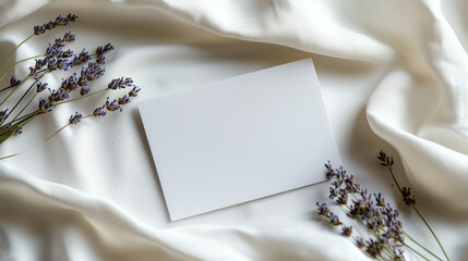 Lavender Flowers with Blank White Card on White Fabric Minimalist Composition