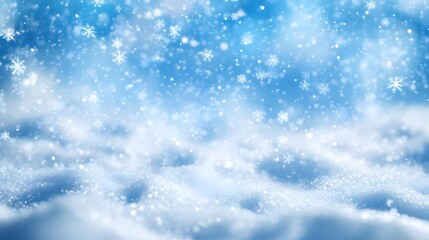 Obraz premium Snowflakes Falling on a Snowy Landscape with a Blue Sky