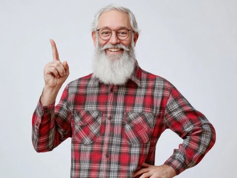 Older gentleman with a beard and glasses, wearing flannel shirt, pointing at the viewer.