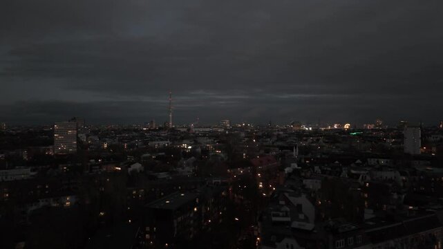 clouds over city at night Aerial flight 