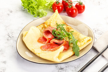 Russian pancake with salmon fish