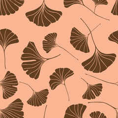 A seamless pattern of ginkgo leaves in dark gold color, a variation of hand-drawn ginkgo leaves, an elegant botanical peach fuzz background 