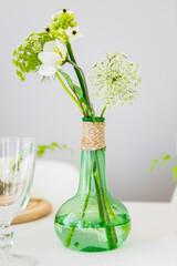 Green and white styled wedding table.