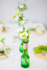 Green and white styled wedding table.