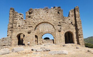 Western view of the ancient basilica in Aspendos antique city in Serik, Antalya
