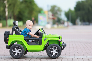 Naklejka premium child driver electric car attraction SUV small