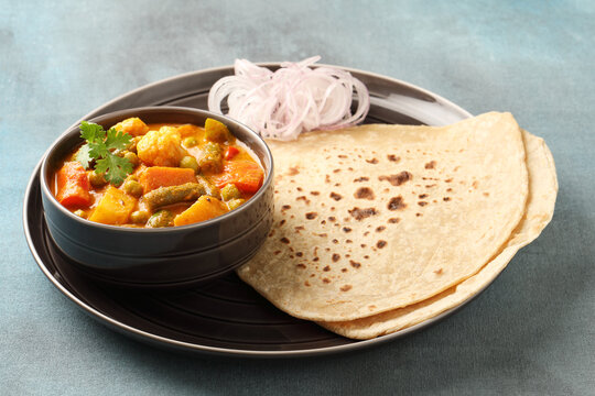 Mix Vegetable dry recipe in a bowl, Indian restaurant style veg recipe served with Chapati