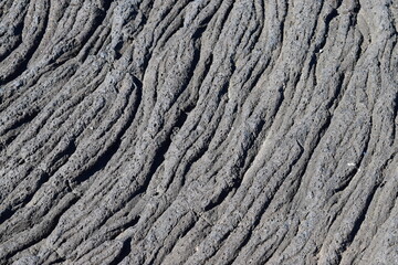 Close-up of natural pattern in black lava stone on Pico, Azores