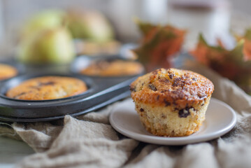 Muffins with chocolate and pears 