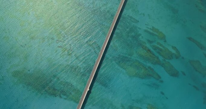 Tilt pan shot of Kouri Big Bridge in Okinawa, Japan