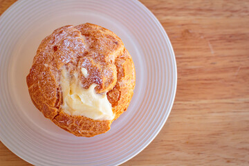 Delicious choux cream at restaurant.