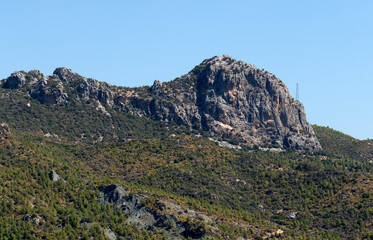 A view of the cliffs and maquis covered hills near the ancient city of Aspendos in the Serik district of Antalya